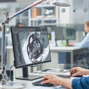 Engineer working on a 3D CAD model of a mechanical part